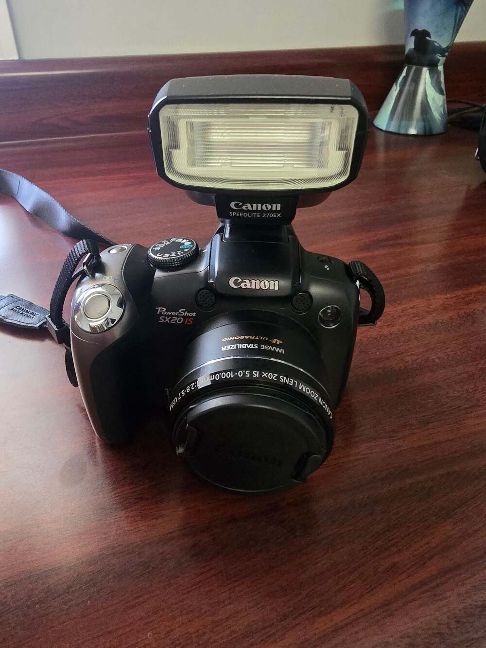 Canon PowerShot SX20 IS 12.1MP Digital Camera with Speedlite 270EX Flash and Car